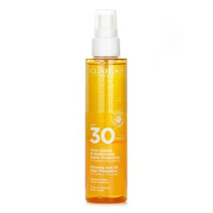 Clarins Glowing Sun Oil High Protection SPF30 слънцезащитен крем 150 мл