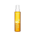 Clarins Glowing Sun Oil High Protection SPF30 слънцезащитен крем 150 мл